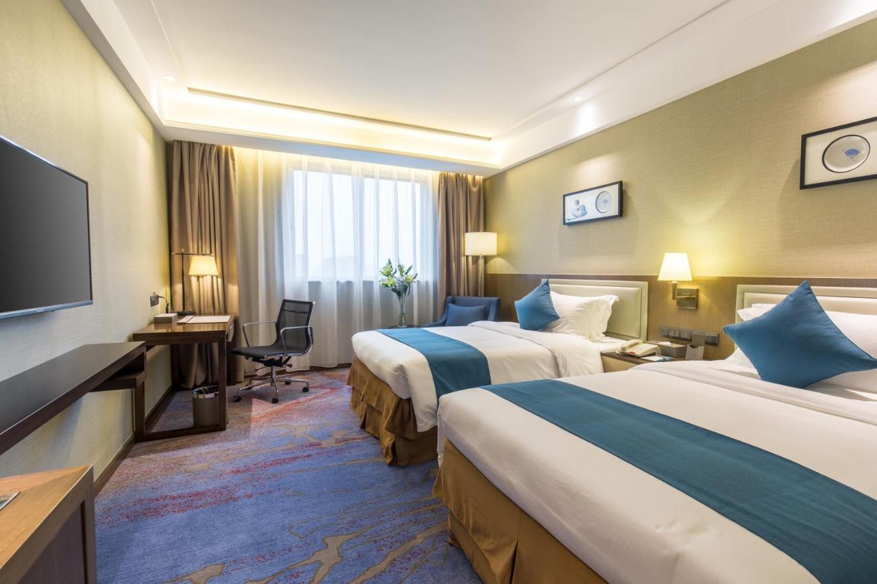 שנג'ן Wan Yue Grand Skylight Hotel מראה חיצוני תמונה